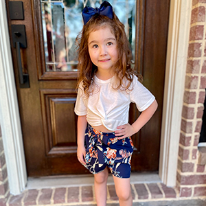 girl white short sleeve crop top and shorts set