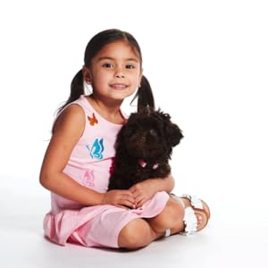 Girl in pink dress with dog